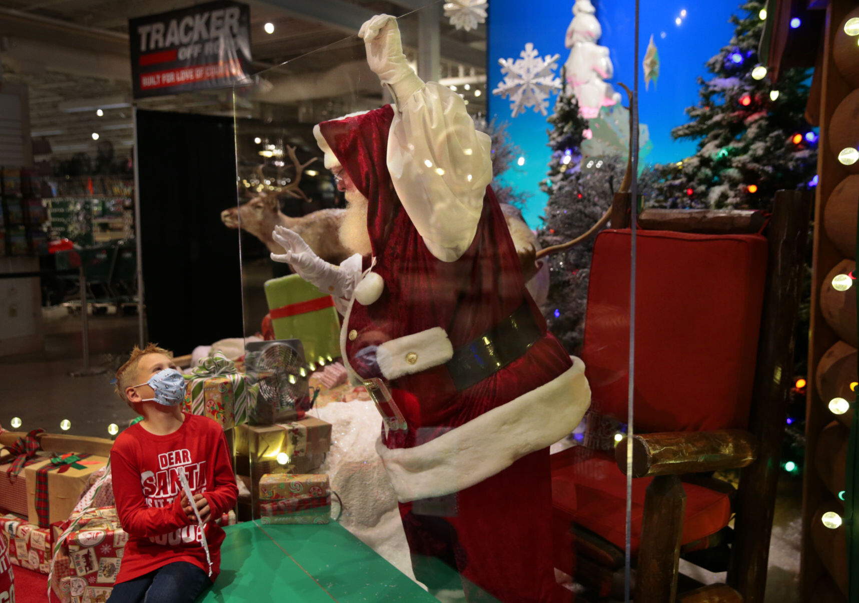 Sanitized Santa appears behind the glass